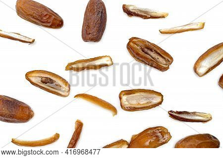 Dry Dates Palm Sliced Isolated On White Background.