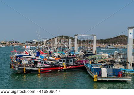 Pyeongtaek, South Korea; April 6, 2021:tour Boats And Fishing Trawlers Docked At Jeongok Marina.