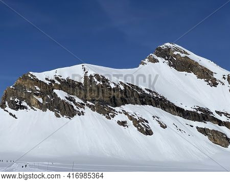 Snowy Alpine Mountain Peak Oldenhorn (oldehore Or Becca D\'audon) Located In A Mountain Massif Les D