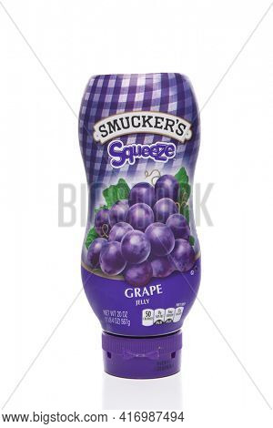 IRVINE, CALIFORNIA - JUNE 28, 2019: A 20 ounce plastic squeeze bottle of Smuckers Grape Jelly. 