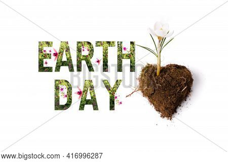 World Earth Day Concept. Lettering Earth Day With Plants And Wonderful Flowers