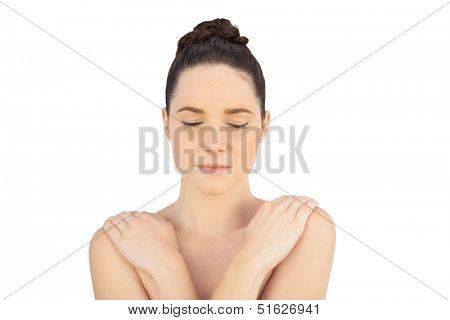 Thoughtful natural model posing on white background