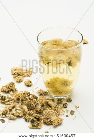 Glass Of Chrysanthemum Flower Tea With Dry Chrysanthemum Flower