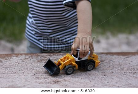 Mano con el Tractor