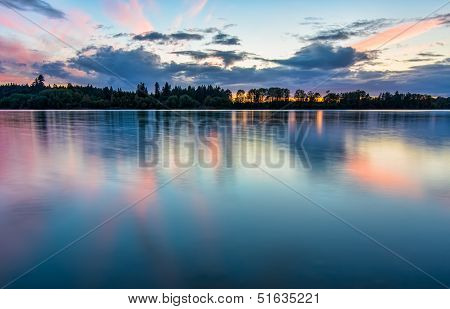 Flowing River With Dramatic Clouds