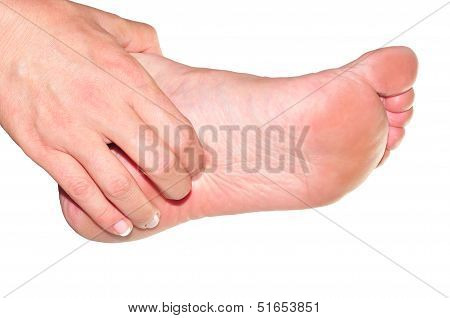 Woman's Hand Being Massaged A Foot