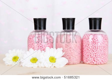 Aromatherapy minerals - colorful bath salt on light background