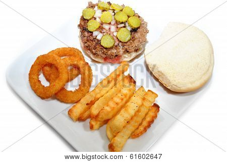 Summer Burger With Onion Rings And French Fries