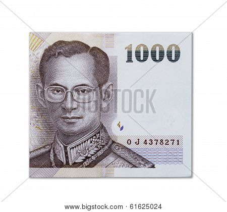 Half of 1000 baht  thai  banknotes on white background