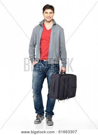 Full portrait of smiling happy man with grey suitcase - isolated on white 