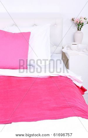 Comfortable soft bed with pillows