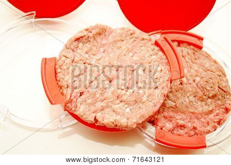 Making Fresh Hamburgers In A Hamburger Press