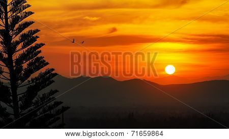 Sunset Over Mountain Range