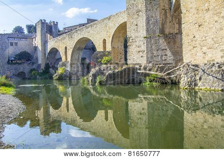 Reflection Stone Bridge Over River