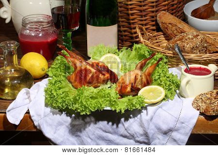 Has Sung Submitted With Wine, Cowberry Sauce And Leaves Of Fresh Salad