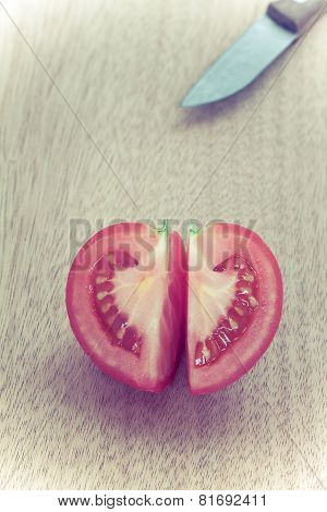 Half Cut Cleave Of Red Potato,look Like Heart Shape,with Knife On Wooden Board