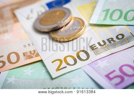 Closeup Of Euro Banknotes And Coins