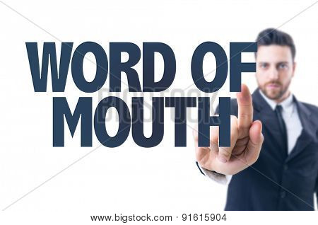 Business man pointing the text: Word of Mouth