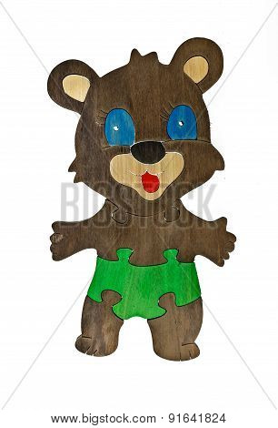 Colorful wooden puzzle in bear shape on isolated background