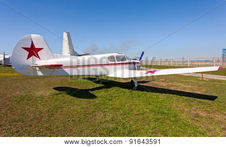 Light Sport Aircraft Yak-18T In Togliatti Technical Museum In Sunny Day