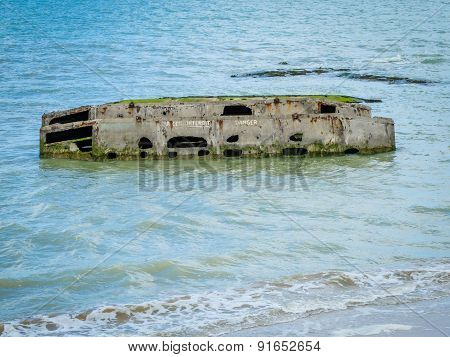 Ruins of Allied Mulberry port in Arromanches, Normandy