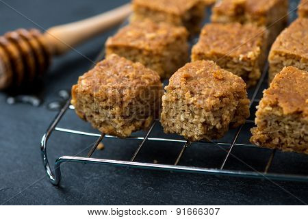 Homemade Healthy Flapjacks With Honey On Cooling Rack