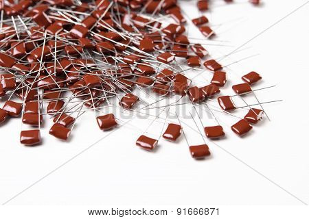 Plenty Of Capacitors Placed On White Surface Bulk