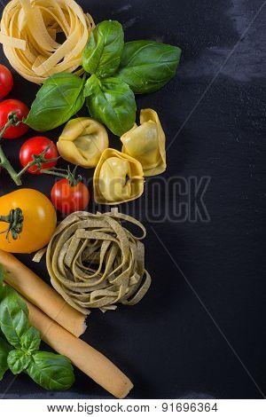Selection Of Italian Tipical Food On Black Background From Above