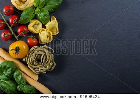 Selection Of Italian Tipical Food On Black Background From Above
