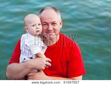 Middle Age Father And His Little Son