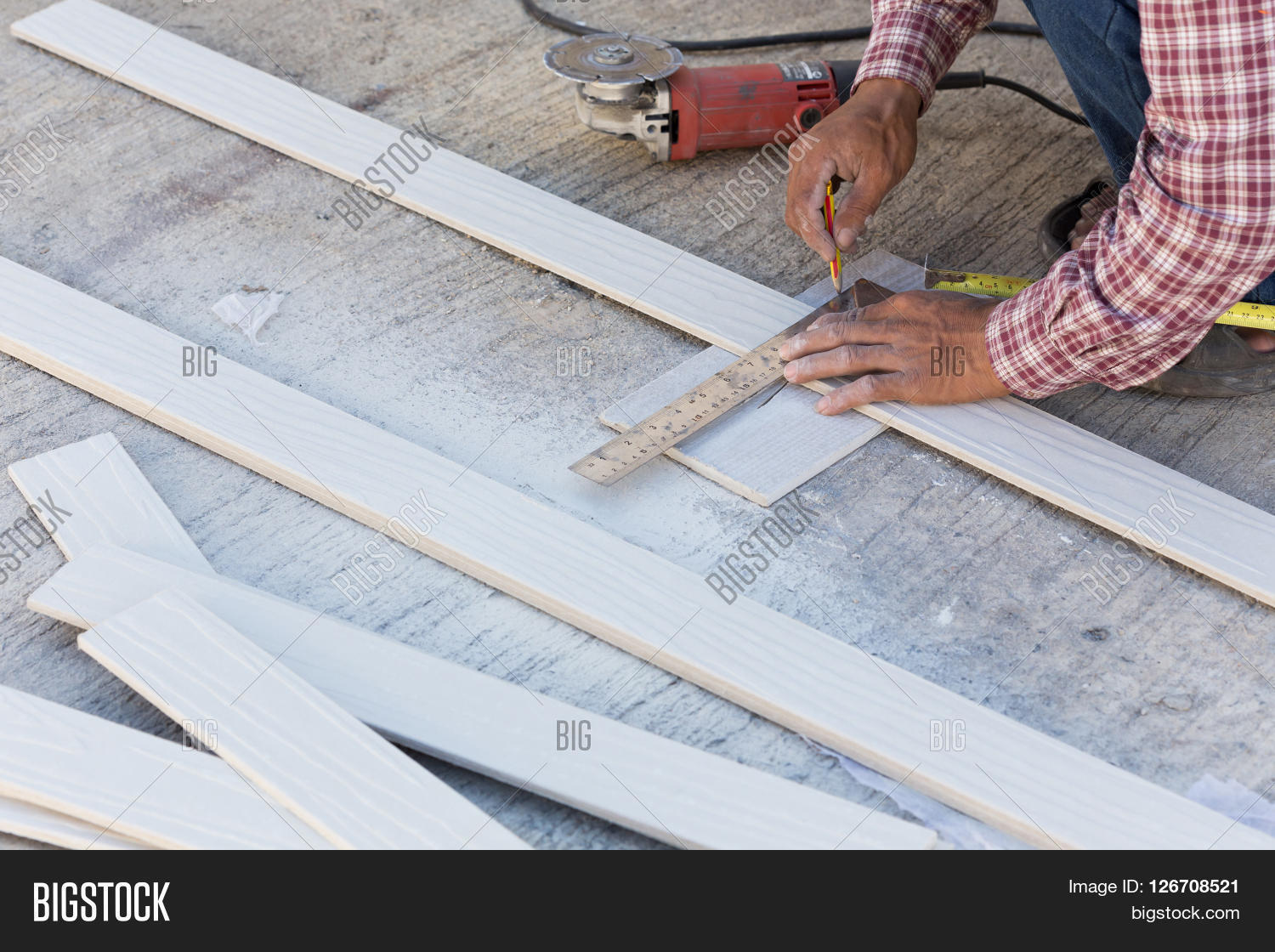 Carpenter Using Ruler Carpenter Using Ruler Image & Photo (Free Trial) | Bigstock