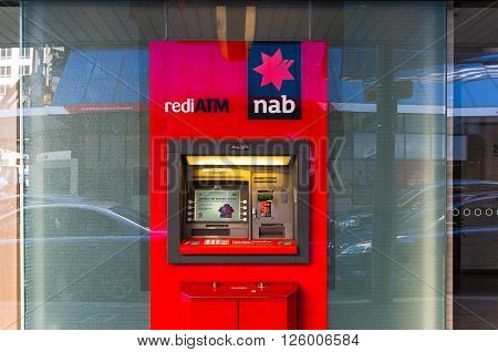 Sydney, Australia - Mar 26, 2016: NAB ATM on on Castlereagh street, Sydney, Australia. NAB is one of the four largest financial institutions in Australia and 21st largest bank in the world
