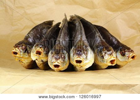 Dead dry salty fish - snack to beer. Space for text.