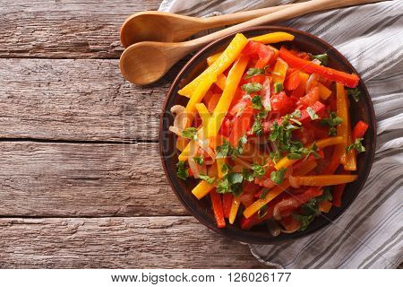Stewed Peppers With Tomatoes And Onions Close Up. Horizontal Top View