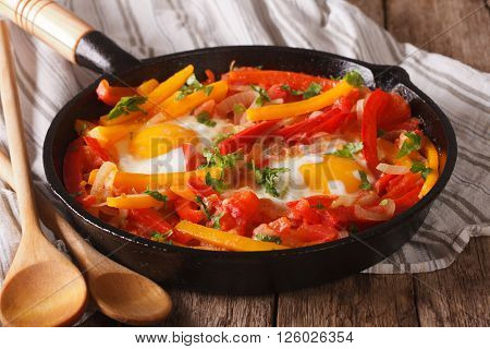 Tasty Piperade: Fried Eggs With Peppers And Tomatoes Close Up In A Pan
