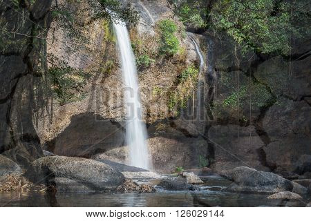Hew Suwat waterfall in Khao yai national park of Thailand, double exposure.