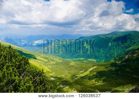 Beautiful blue sky and glade high up in Carpathian mountains