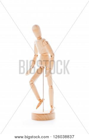 Lointed wooden dummy isolated on white background