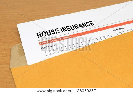 House Insurance application form on brown envelope