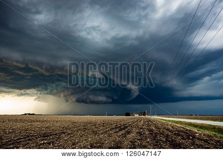 A tornado warned supercell thunderstorm rages in Illinois in Spring 2016.