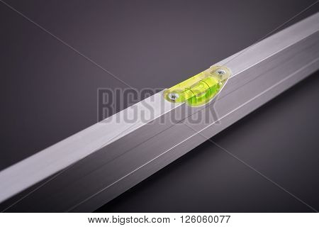 Aluminum building level, handheld construction tools, measuring tools, precision measuring instrument, modern building, construction, bubble level closeup
