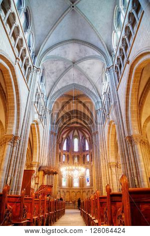 GENEVA SWITZERLAND - NOVEMBER 28: St Pierre Cathedral interior with people on November 28 2015 in Geneva Switzerland.