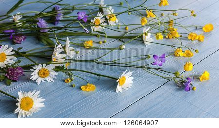 bouquet of wild flowers on a wooden horizontal 
grunge
** Note: Visible grain at 100%, best at smaller sizes