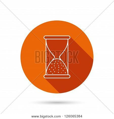 Hourglass icon. Sand end time sign. Hour ends symbol. Round orange web button with shadow.