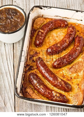 close up of rustic english pub grub toad in the hole