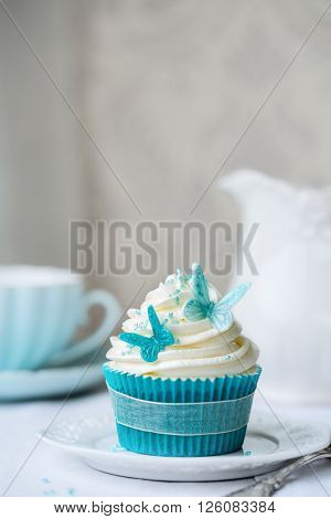 Cupcake decorated with sugarpaste butterflies