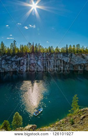 Tourist boat mouring in Marble Canyon under the sun