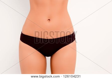 Close Up Photo Of Girl's Bikini Area With Black Panties