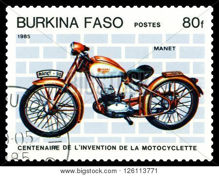 STAVROPOL RUSSIA - MARCH 16 2016: a stamp printed in Burkina Faso shows an old motorcycle Manet-90 stamp devoted to the centenary of the invention of motorcycle circa 1985