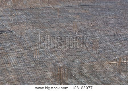 Foundation building of steel and concrete for the construction of an apartment building with underground parking.